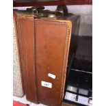 A vintage brown suitcase. Catalogue only, live bidding available via our webiste. If you require P&P