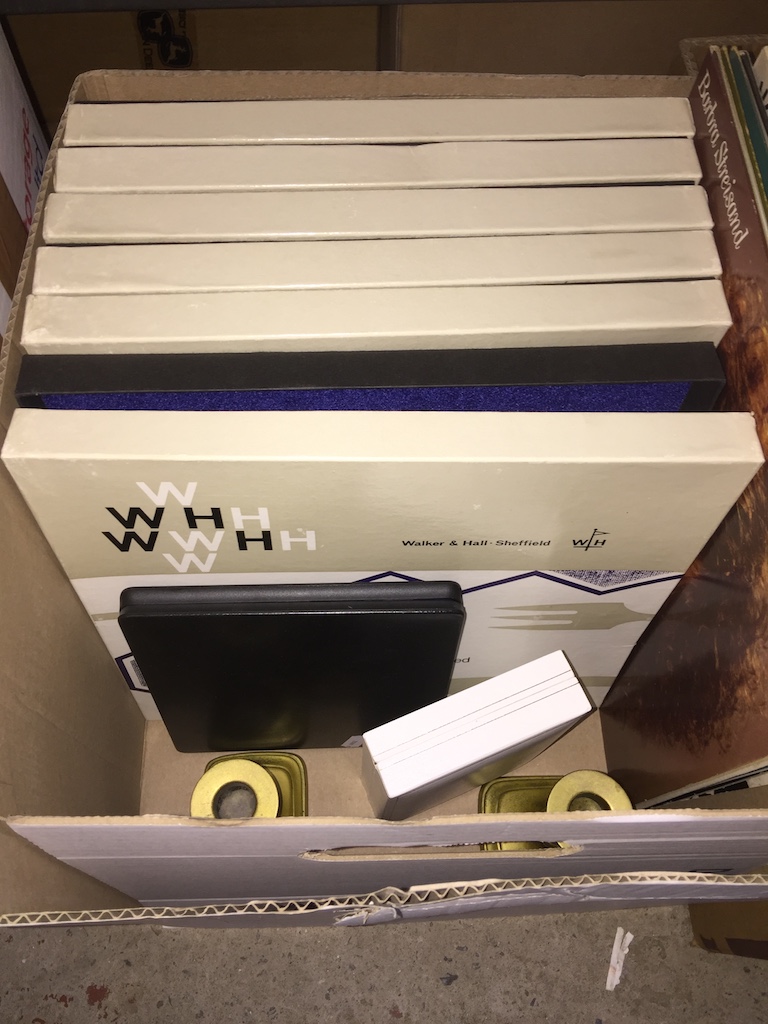 Box with LPs and boxed cutlery sets Catalogue only, live bidding available via our webiste. If you