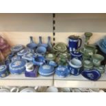 A collection of over 40 pieces of Wedgwood jasperware in pale plue, dark blue, and green Catalogue