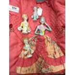 Four pincushion dolls and a cushion Catalogue only, live bidding available via our webiste. If you