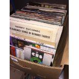 A box of LPs, few 45s and a case of old vynil. Catalogue only, live bidding available via our