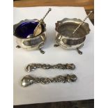 Pair of small silver salts - one glass liner broken, together with two white metal spoons stamped