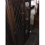 An oak and leaded glass Jaycee cabinet bookcase - front left door glass cracked. Catalogue only,