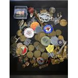 A box of badges, cufflinks and tokens. Catalogue only, live bidding available via our webiste. If