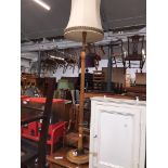 A beech standard lamp Catalogue only, live bidding available via our webiste. If you require P&P