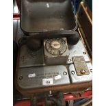 A field telephone. Catalogue only, live bidding available via our webiste. If you require P&P please