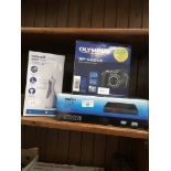 ProLine DVD player, Olympus SP-560 UZ digital compact camera and Waterpik waterflosser. Catalogue