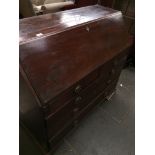 A Georgian mahogany bureau Catalogue only, live bidding available via our webiste. If you require