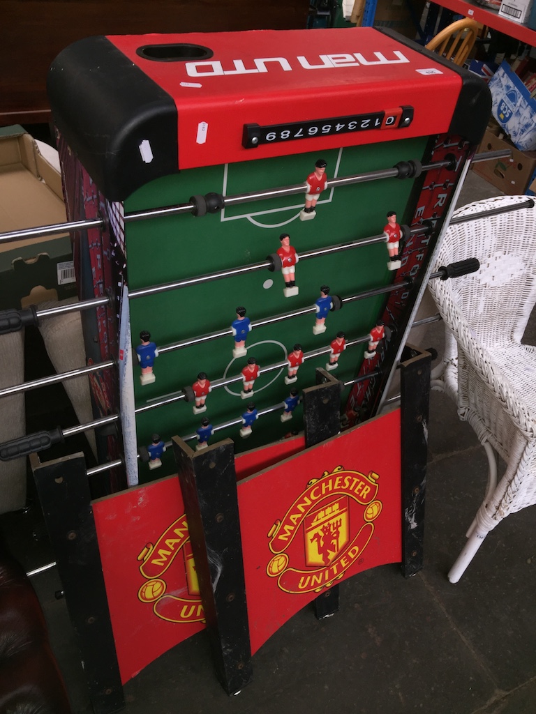 A Manchester United table soccer game Catalogue only, live bidding available via our webiste. If you