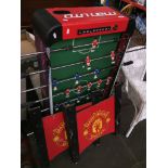 A Manchester United table soccer game Catalogue only, live bidding available via our webiste. If you