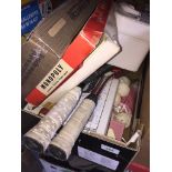 A box of misc to include instant BBQ, Monopoly game, 2 raquets, vanity case with contents, OS