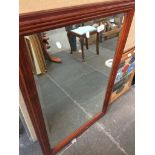 A mahogany bevelled glass large mirror - 92 x 62 cm. Catalogue only, live bidding available via