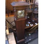 An Edwardian mahogany cased granddaughter clock Catalogue only, live bidding available via our