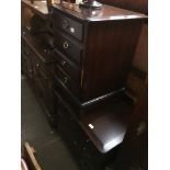 A Stag chest of drawers, Stag bedside chest and Stag bedside cabinet Catalogue only, live bidding