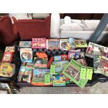 A large box of vintage board games including Subbuteo, Panini football sticker albums, etc.