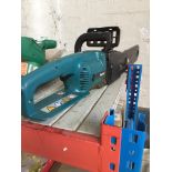 An electric Makita UC3501 A chainsaw. Catalogue only, live bidding available via our webiste. If you