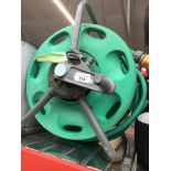 A garden hose reel. The-saleroom.com showing catalogue only, live bidding available via our website.