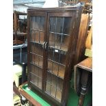 A leaded glass corner cabinet The-saleroom.com showing catalogue only, live bidding available via
