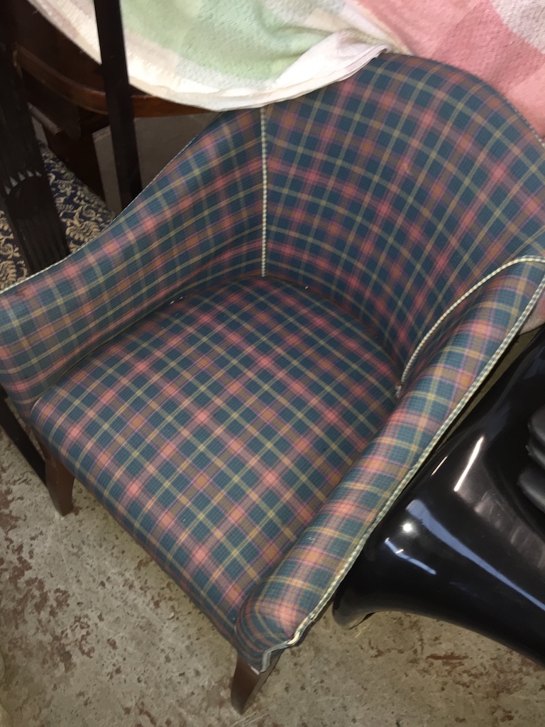 A check pattern tub chair The-saleroom.com showing catalogue only, live bidding available via our