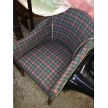 A check pattern tub chair The-saleroom.com showing catalogue only, live bidding available via our