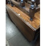 Large oak rectangular drop leaf twist leg table The-saleroom.com showing catalogue only, live