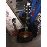 A boxed Classical Clifton acoustic guitar with soft case The-saleroom.com showing catalogue only,