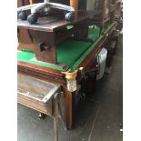 An 8' snooker table with accessories The-saleroom.com showing catalogue only, live bidding available