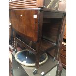 Drop leaf trolley The-saleroom.com showing catalogue only, live bidding available via our website.