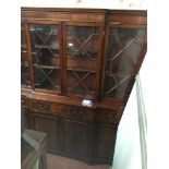 A reproduction mahogany breakfront cabinet bookcase with secretaire drawer The-saleroom.com