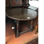 Round low oak table The-saleroom.com showing catalogue only, live bidding available via our website.