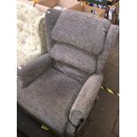 A grey electric reclining armchair The-saleroom.com showing catalogue only, live bidding available