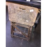 A set of small wooden stepladders. The-saleroom.com showing catalogue only, live bidding available