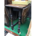 A drop leaf table The-saleroom.com showing catalogue only, live bidding available via our website.