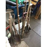 4 bundles of garden tools, fork, spades, pickaxes. etc. The-saleroom.com showing catalogue only,