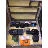 Metal case with camera accessories - no camera. The-saleroom.com showing catalogue only, live