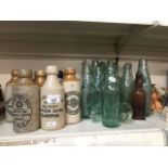 Collection of stoneware and glass bottles The-saleroom.com showing catalogue only, live bidding