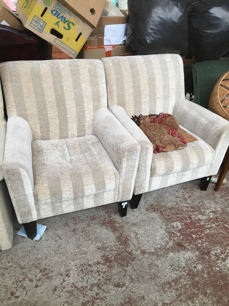 A pair of modern striped tub chairs The-saleroom.com showing catalogue only, live bidding