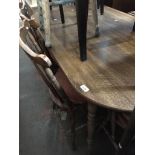 Dining table and spindle chairs The-saleroom.com showing catalogue only, live bidding available