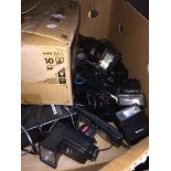 A box of camera accessories and a JVC Videomovie camera, model : GR-AX860E with accessories in