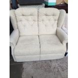 A two seater yellow settee The-saleroom.com showing catalogue only, live bidding available via our