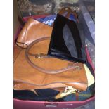 A box of handbags. The-saleroom.com showing catalogue only, live bidding available via our