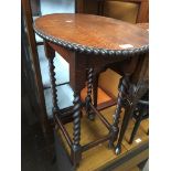 Oval twist leg oak table The-saleroom.com showing catalogue only, live bidding available via our