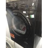 A black Hotpoint Aquarius washing machine The-saleroom.com showing catalogue only, live bidding