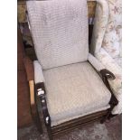 A retro armchair The-saleroom.com showing catalogue only, live bidding available via our website. If