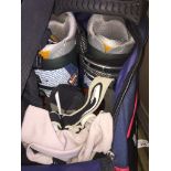 A pair of Salomon ski boots, goggles, glasses and gloves. The-saleroom.com showing catalogue only,