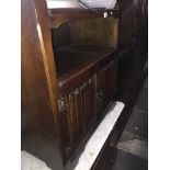 Oak cabinet with linenfold doors The-saleroom.com showing catalogue only, live bidding available via