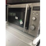 A Cookworks microwave The-saleroom.com showing catalogue only, live bidding available via our