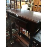 A mahogany hall table with drawer The-saleroom.com showing catalogue only, live bidding available