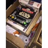 A box of games and Wii items The-saleroom.com showing catalogue only, live bidding available via our