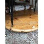 A round pine table The-saleroom.com showing catalogue only, live bidding available via our